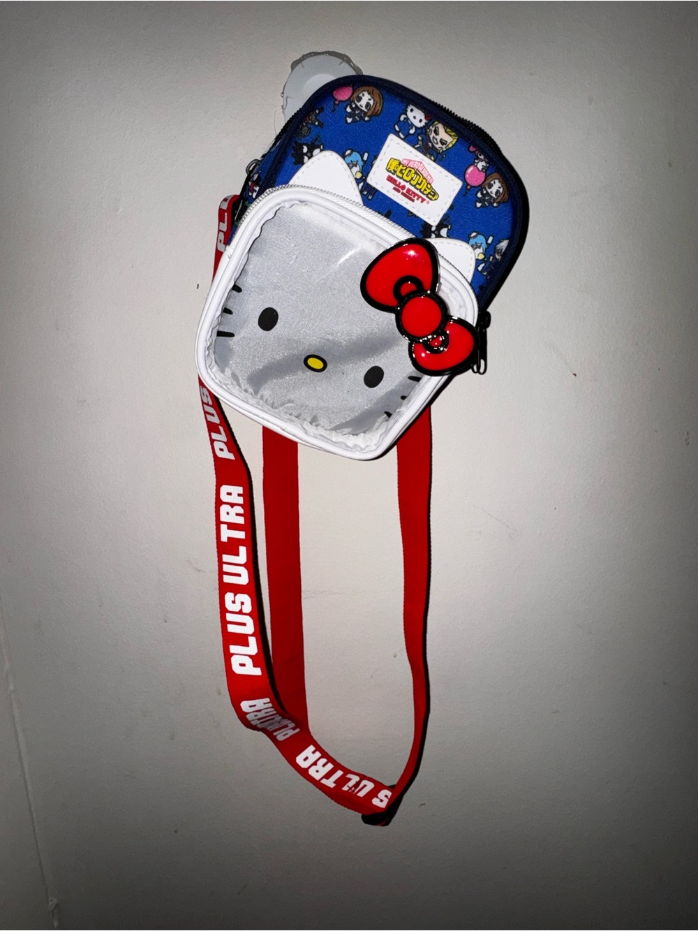 Hello Kitty Blue Patterned Mini Crossbody with White Face & Red Bow